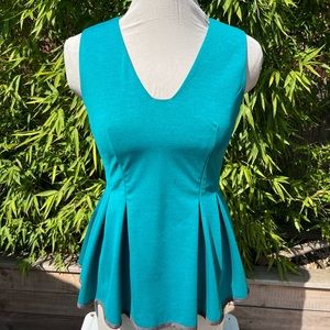 Custom Peplum Sleeveless Blouse